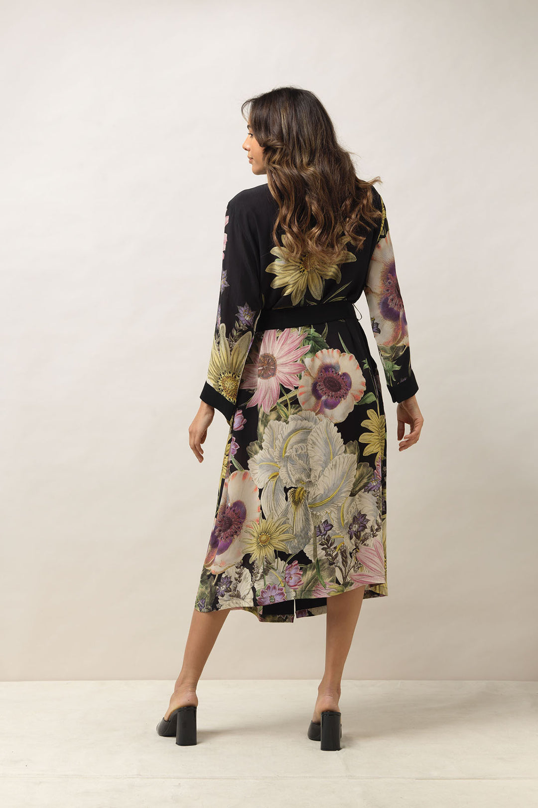 ladies crepe dressing gown with a floral daisy print on a black background by One Hundred Stars