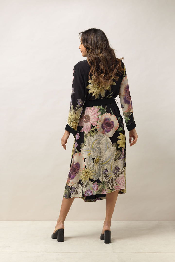 ladies crepe dressing gown with a floral daisy print on a black background by One Hundred Stars