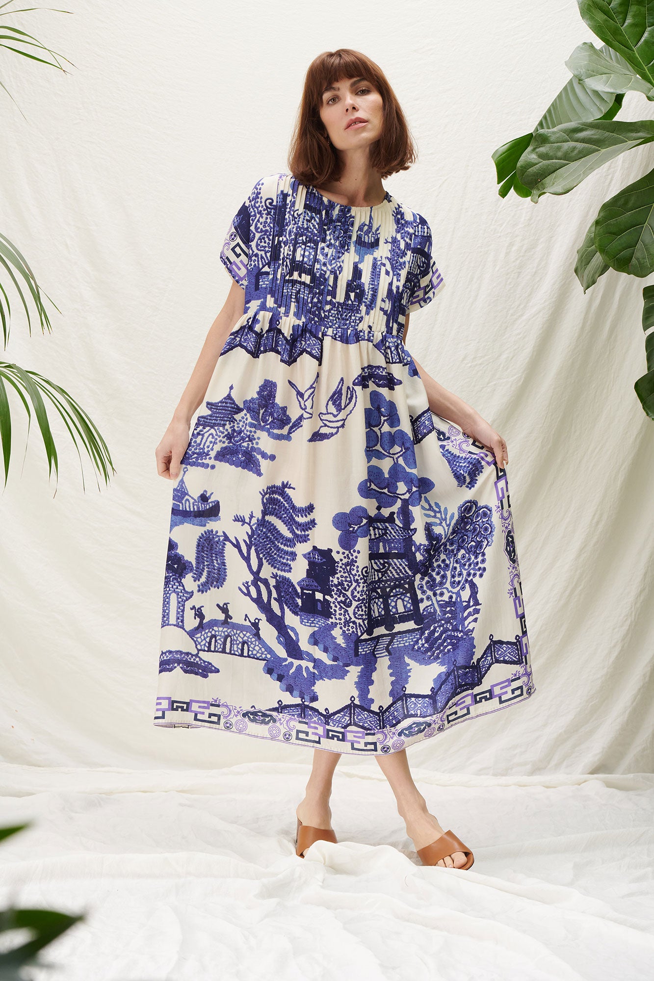 http://onehundredstars.co.uk/cdn/shop/files/Giant-Willow-Blue-Pleat-Dress-5.jpg?v=1703001281