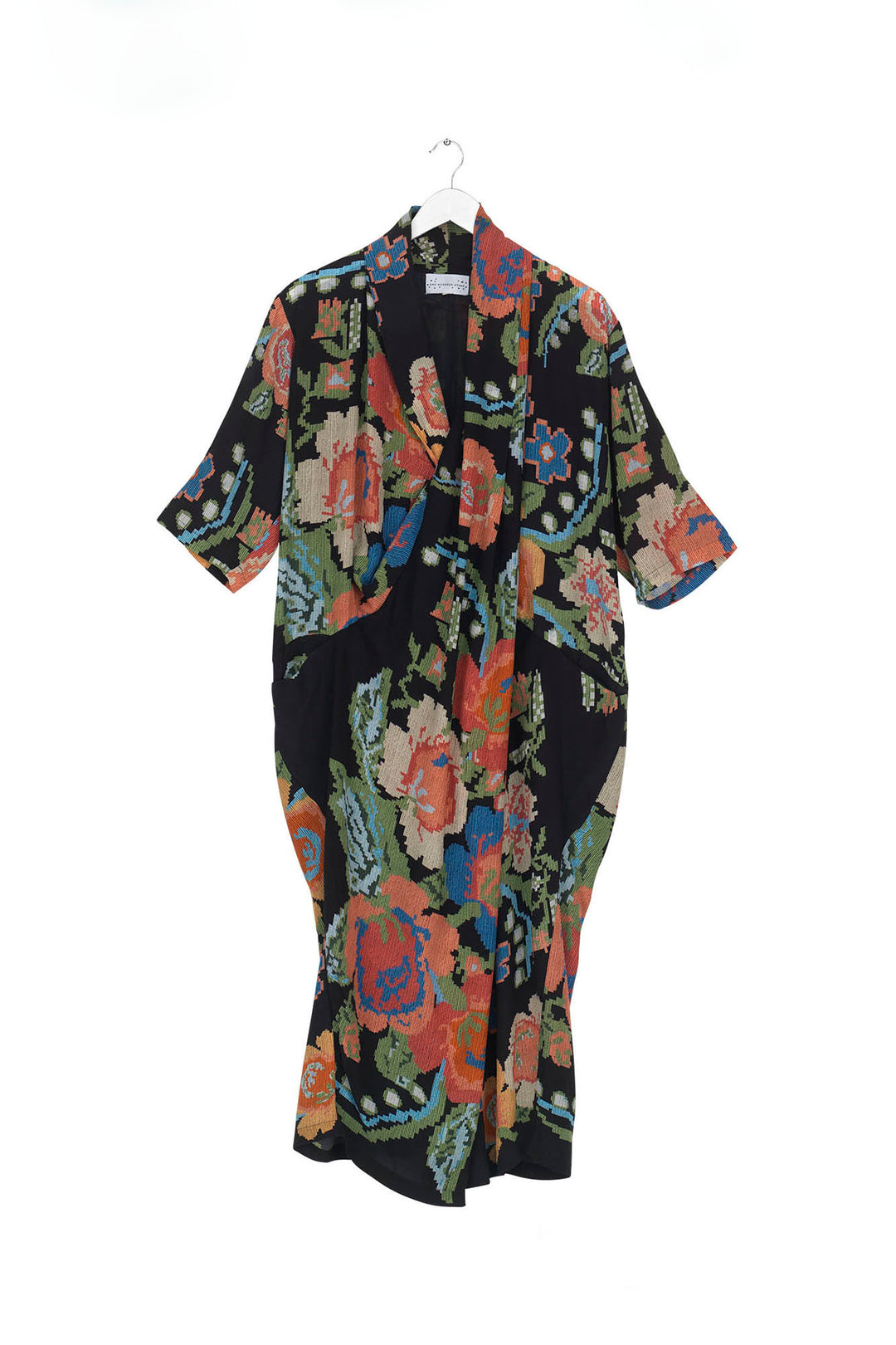 ladies rachel dress cowl neck in woven flower print featuring colourful flowers on a black background by One Hundred Stars