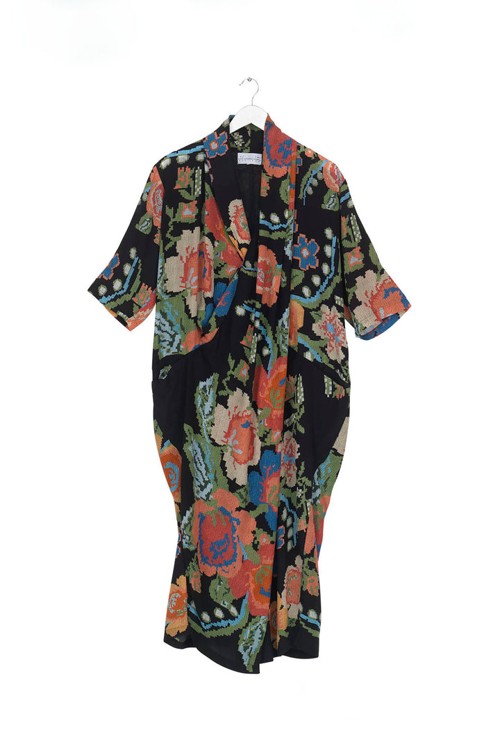 ladies rachel dress cowl neck in woven flower print featuring colourful flowers on a black background by One Hundred Stars