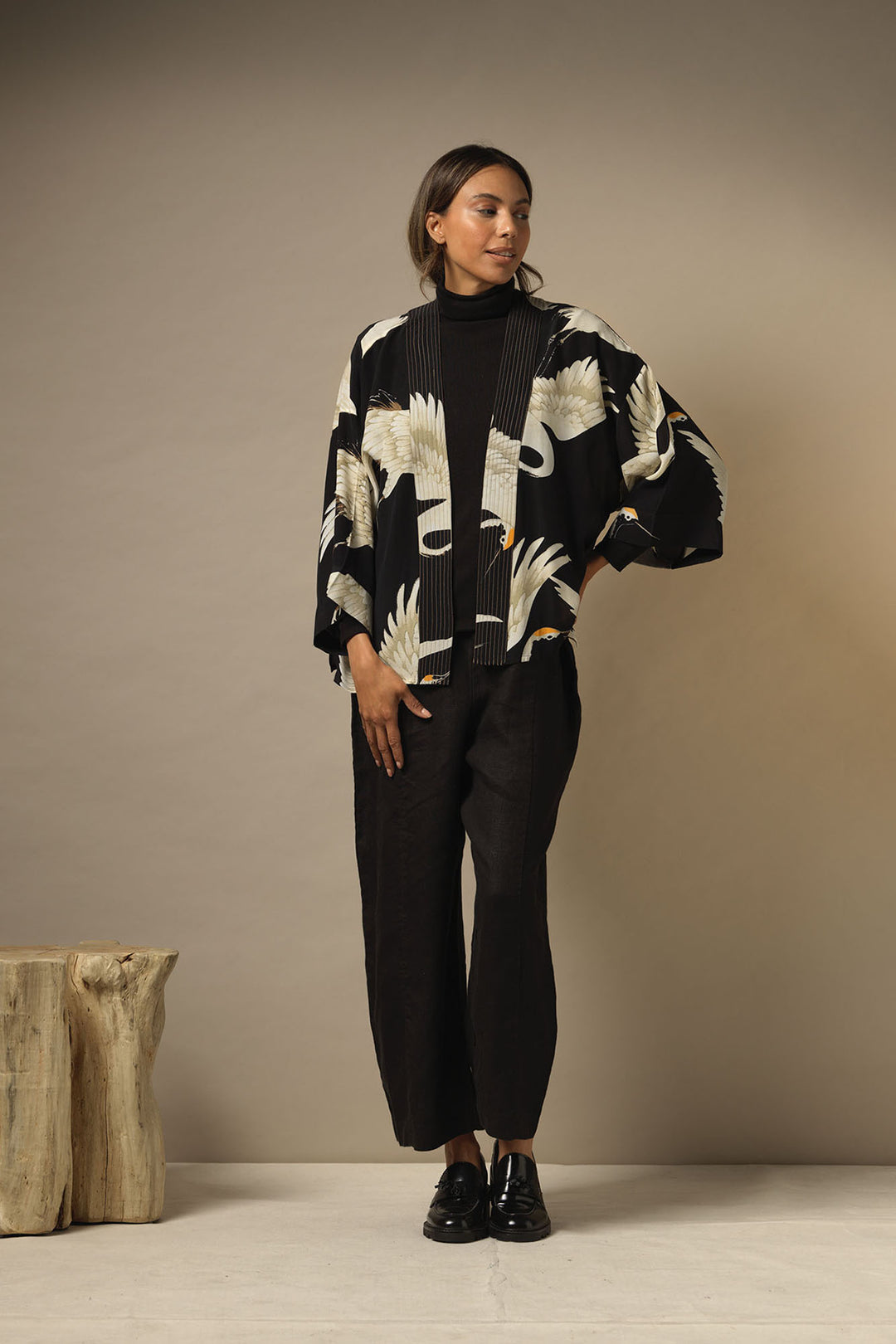 ladies short crepe kimono jacket black background with stork bird print by One Hundred Stars