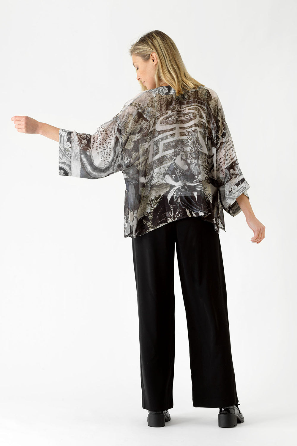 ladies short kimono jacket winter design coloured in tones of black, grey and subtle green print by One Hundred Stars