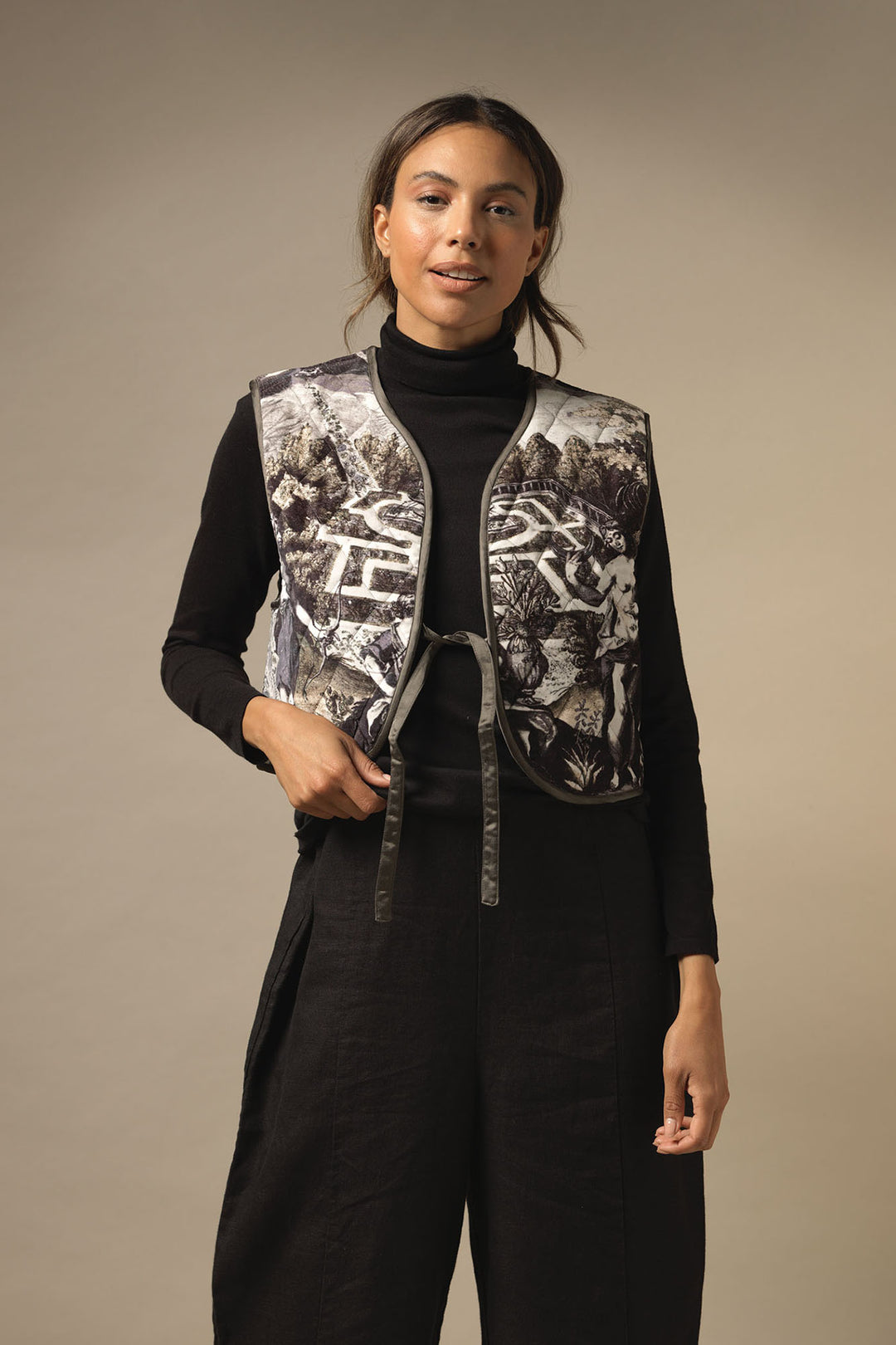 ladies short velvet gilet coloured in tones of black, grey and subtle green print by One Hundred Stars