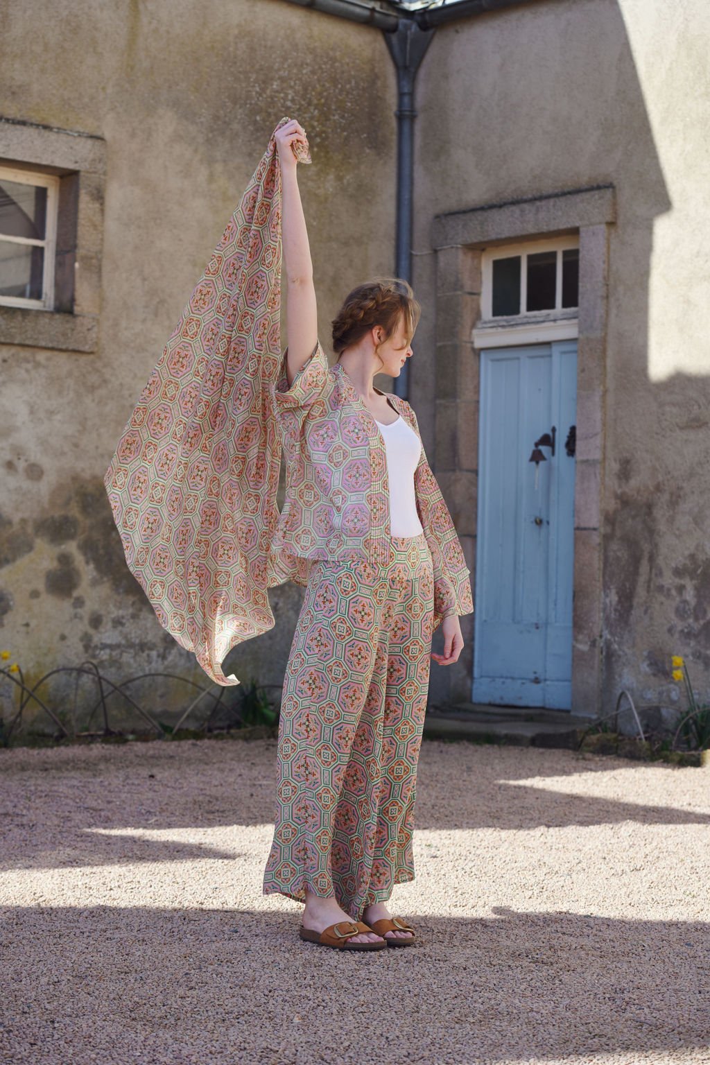 Women's palazzo trouser pants in a vintage tiles pink print by One Hundred Stars