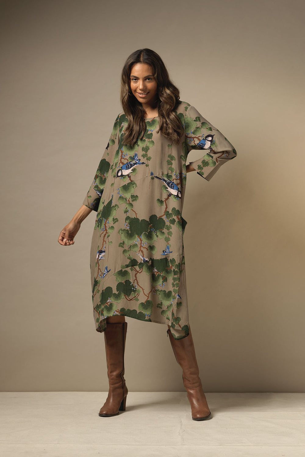 Asymmetric dress with pockets ladies with green maple leaf pattern on a stone background by One Hundred Stars