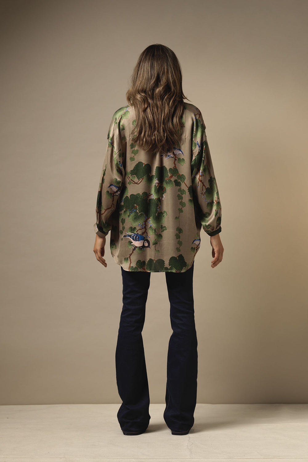 Satin long sleeve autumn winter ladies shirt with green maple leaf pattern on a stone background by One Hundred Stars