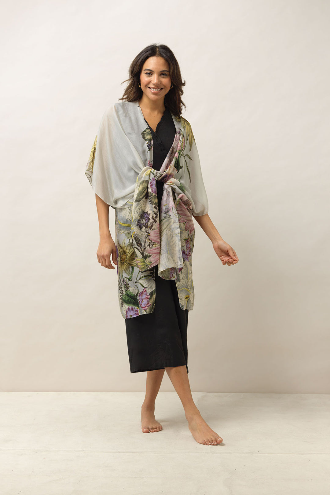 Women's lightweight throwover shawl in stone with daisy floral print by One Hundred Stars