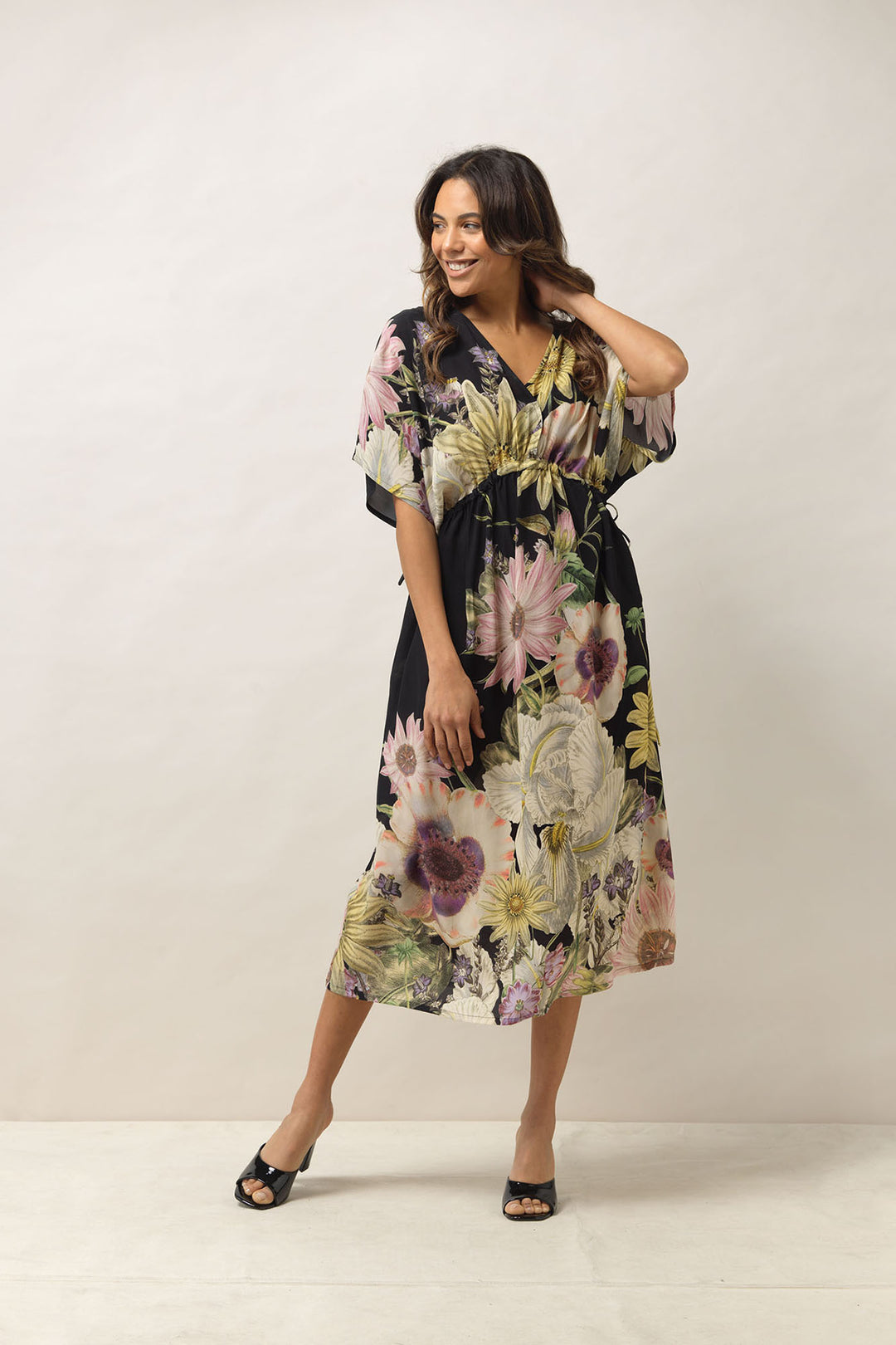 Women's lightweight beach cover up dress with tie waist. black with daisy floral print by One Hundred Stars