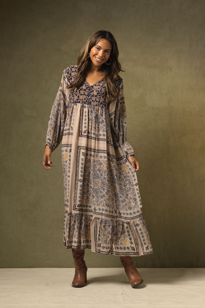 winter long sleeve maxi boho style dress with mehndi blue print on a light brown background by One Hundred Stars