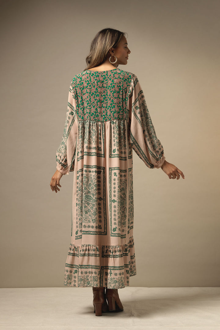 boho style ladies maxi dress long sleeves with mehndi green print on a light brown background by One Hundred Stars