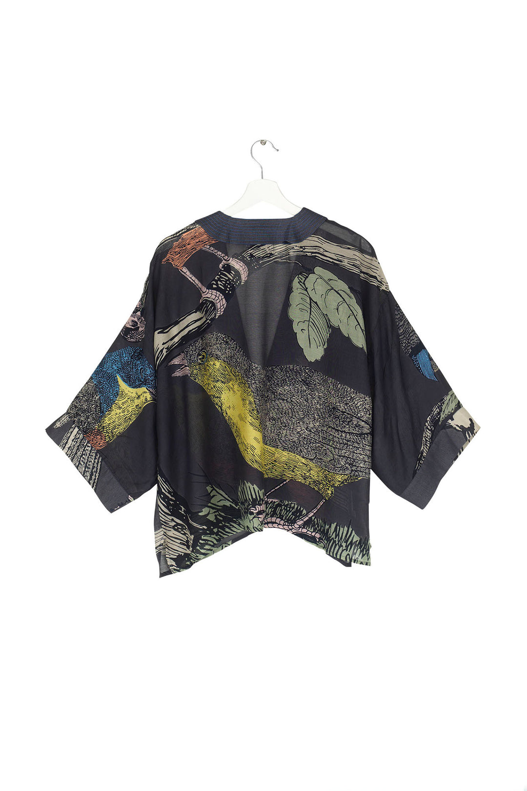 short ladies kimono with a colourful bird print on a dark navy background by One Hundred Stars