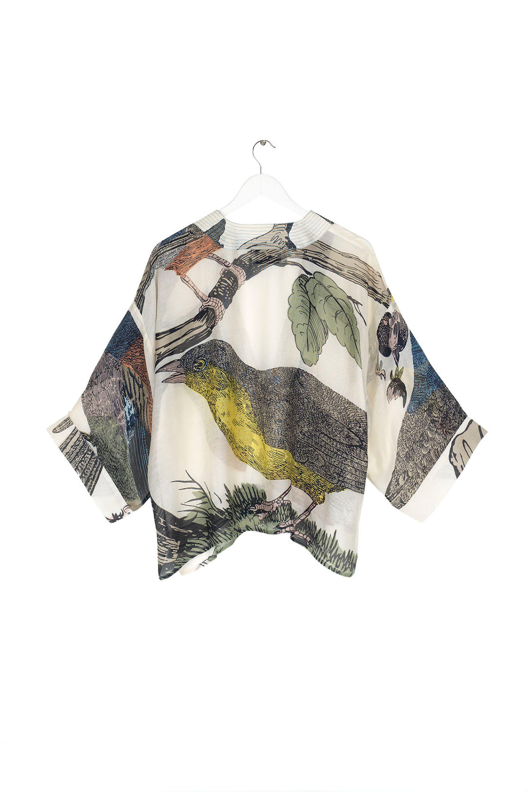 ladies lightweight winter short kimono with a colourful bird print on a light stone background by One Hundred Stars