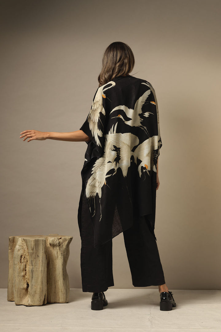 ladies winter shawl throwover kaftan black background with stork bird print by One Hundred Stars