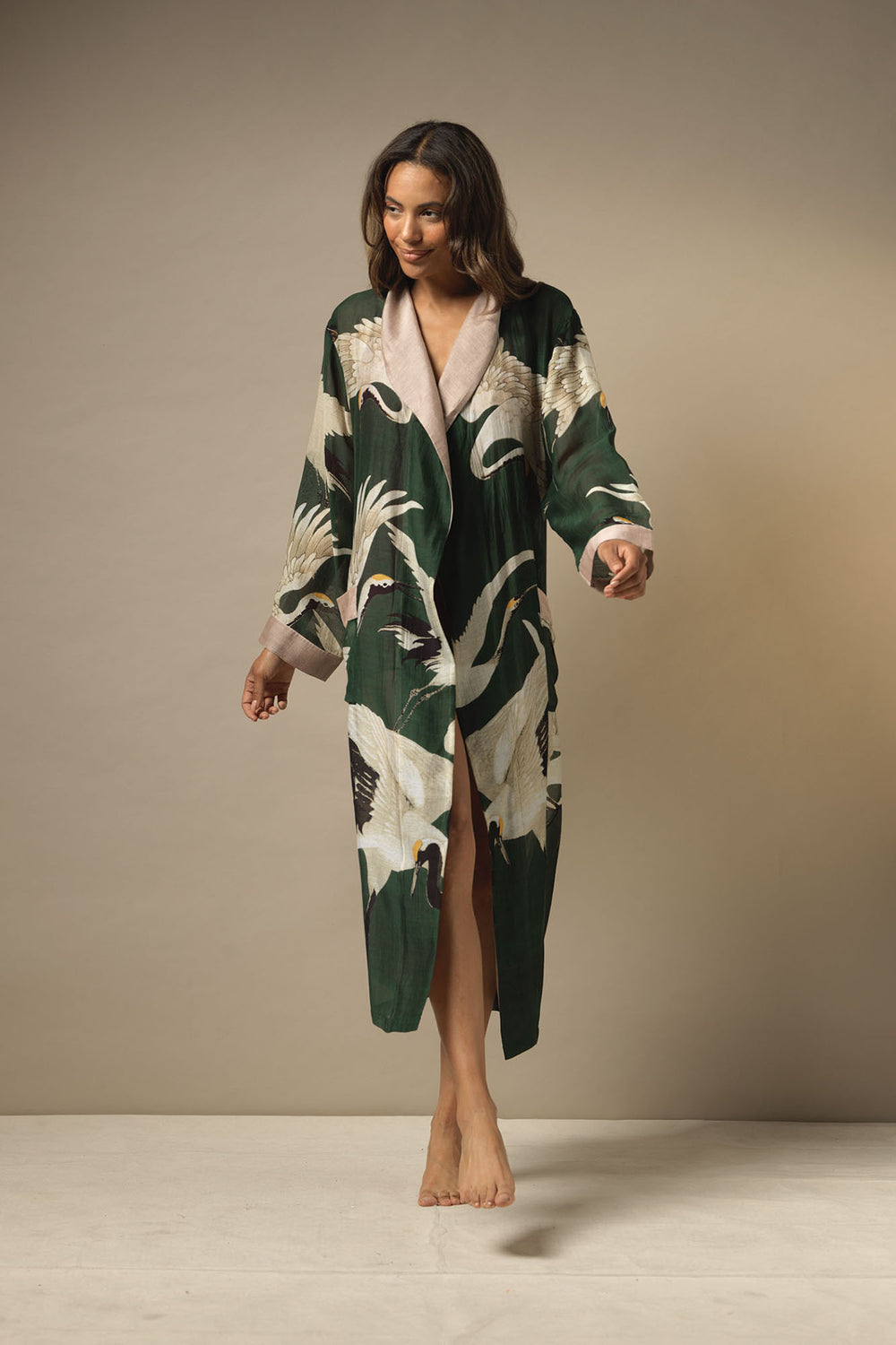 ladies dressing gown green background with stork bird print by One Hundred Stars
