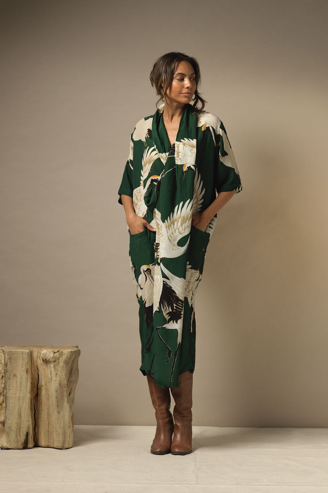 ladies pockets cowl neck Party Pockets midi dress green background with stork bird print by One Hundred Stars