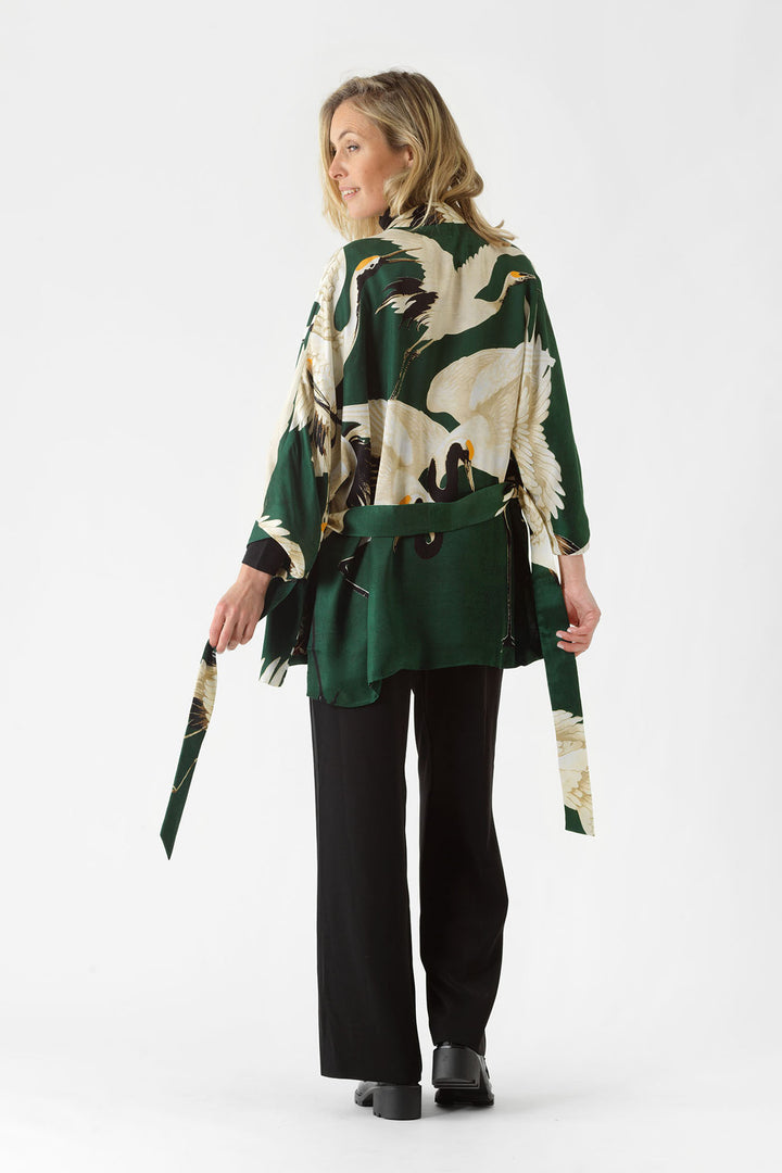 ladies belted satin jacket green background with stork bird print by One Hundred Stars
