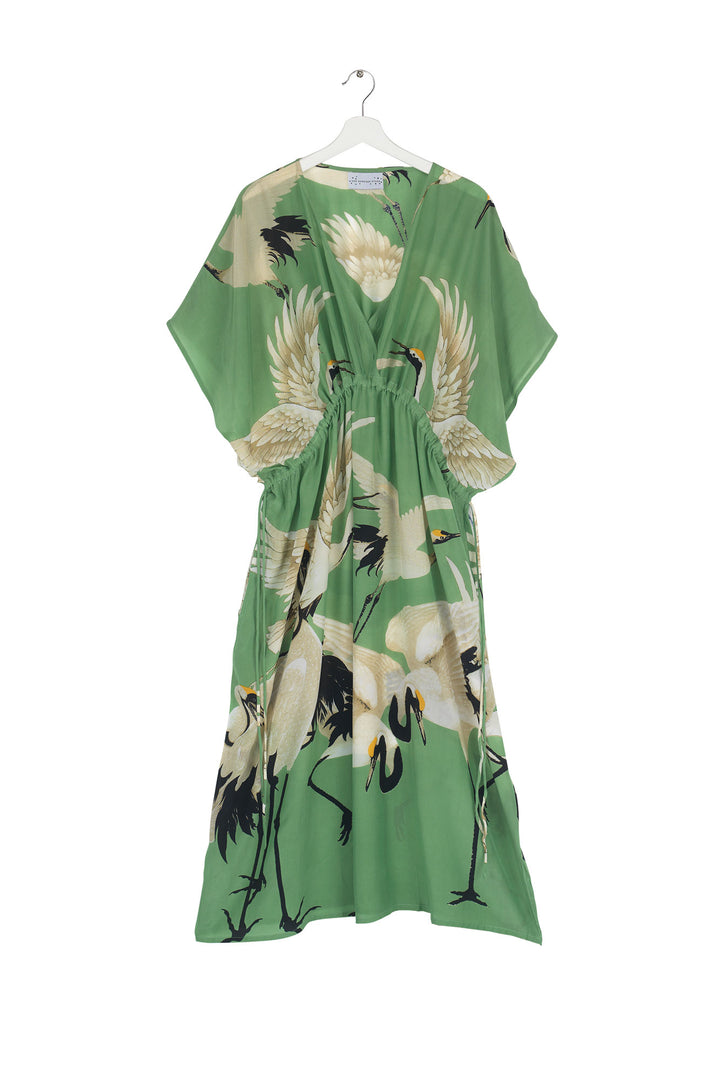 Women's lightweight beach cover up dress with tie waist in pea green and white stork print by One Hundred Stars