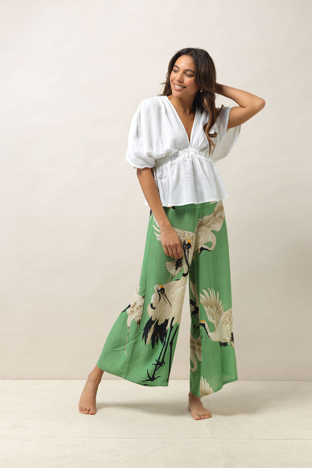 Women's palazzo pants trousers crepe in in pea green and white stork print by One Hundred Stars