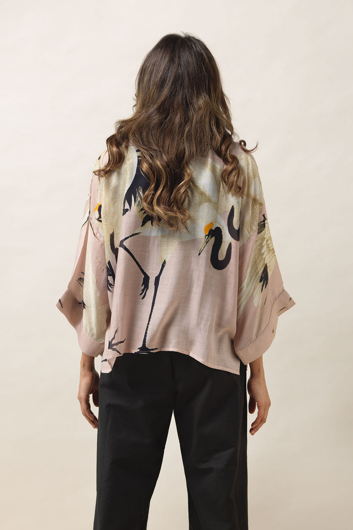 One Hundred Stars Stork Plaster Pink Kimono- Our bestselling kimono jackets have loose ¾ length sleeves, an open front and a lightly embroidered lapel. Pair with a matching camisole and your favourite jeans in summer or layer over a polo neck during the cooler months.