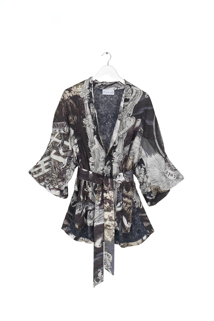ladies satin wrap jacket coloured in tones of black, grey and subtle green print by One Hundred Stars