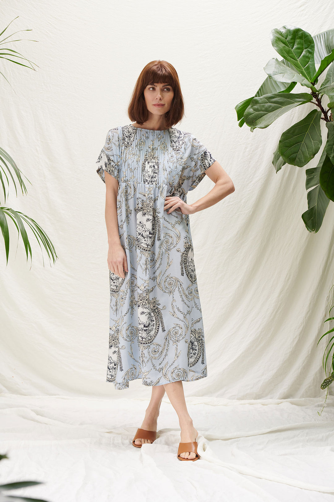 pleated valentine print dress in baby blue by one hundred stars