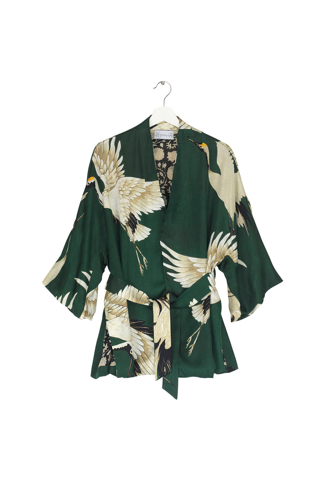 ladies belted wrap jacket satin green background with stork bird print by One Hundred Stars