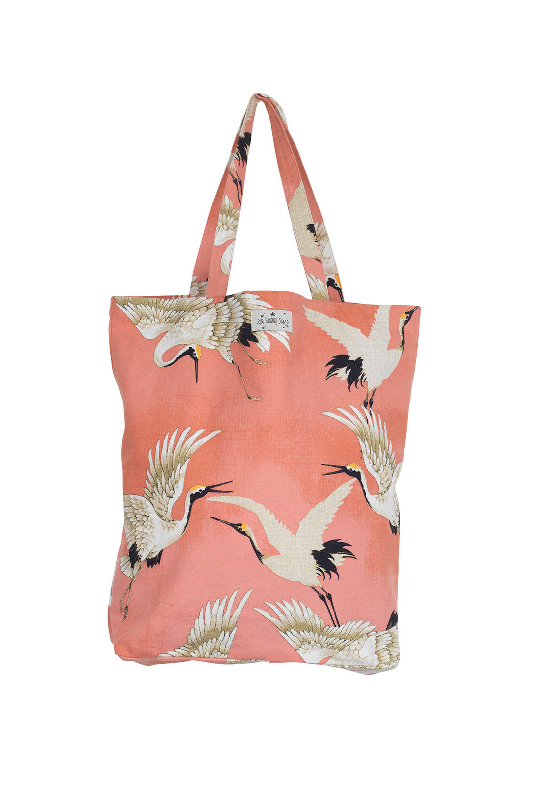 This One Hundred Stars Stork Crane Lipstick Pink Bag is made from 100% sustainable cotton, is just as versatile as it is beautiful. Whether it becomes your go to reusable shopping bag, a classic tote for keeping your books in or a chic beach bag, this classic pink and white print is sure to turn heads!