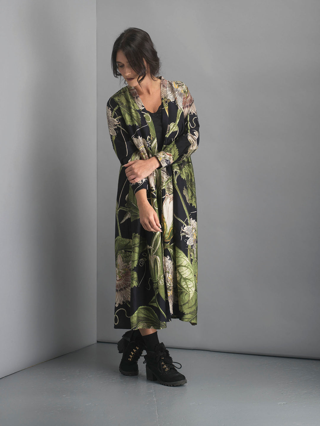 Passion Flower or 'Passiflora' print duster coat in black, as part of the The One Hundred Stars collaboration with KEW Royal Botanic Gardens. 