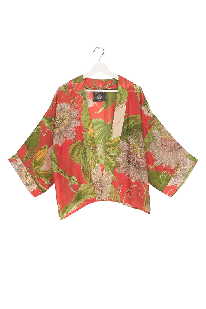 KEW Passion Flower Scarlet Red Kimono- Our bestselling kimono jackets have loose ¾ length sleeves, an open front and a lightly embroidered lapel. Pair with a matching camisole and your favourite jeans in summer or layer over a polo neck during the cooler months.