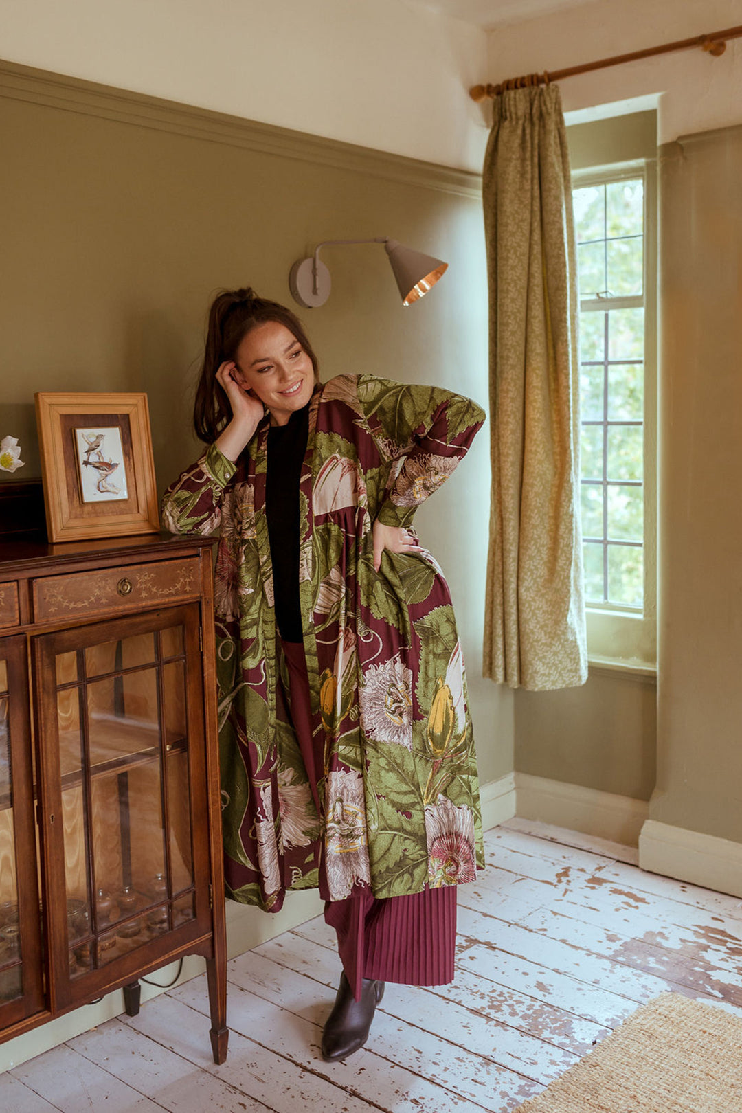 KEW Passion Flower Burgundy Duster Coat- This stunning shape is both stylish and versatile, whether you choose to wear our duster coat as a luxurious house coat, as part of a chic ensemble during the day or over a little black dress during the evening.