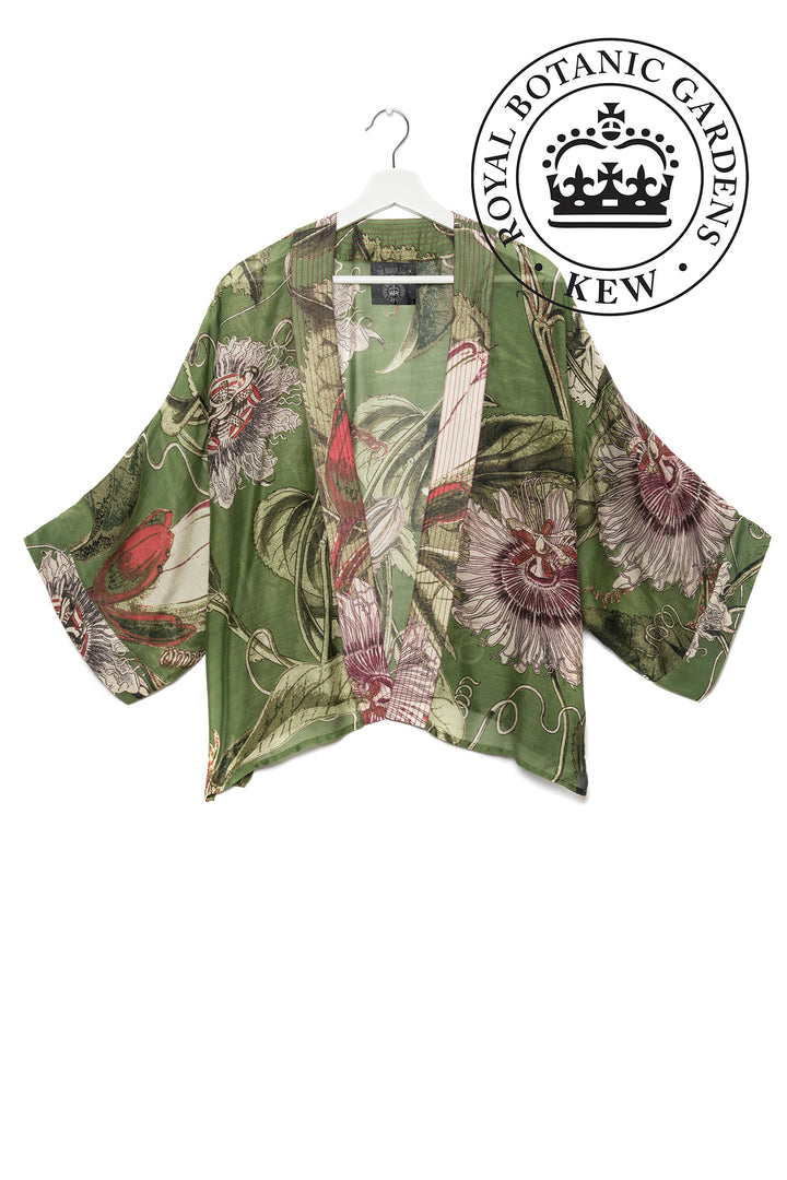KEW Passion Flower Green Kimono- Our bestselling kimono jackets have loose ¾ length sleeves, an open front and a lightly embroidered lapel. Pair with a matching camisole and your favourite jeans in summer or layer over a polo neck during the cooler months.