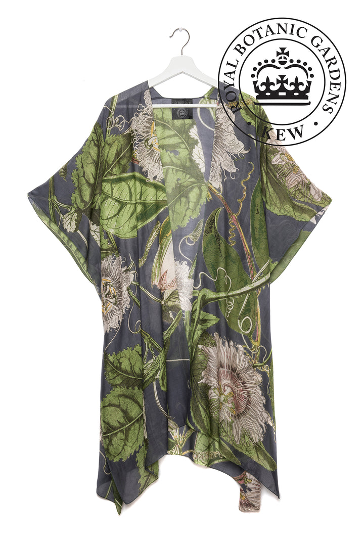 KEW Passion Flower Grey Throwover- These lightweight throwovers make the perfect cover up, they are mid-length with an open front and loose arms, perfect for the warmer months or worn on holiday as the ideal resort wear. 