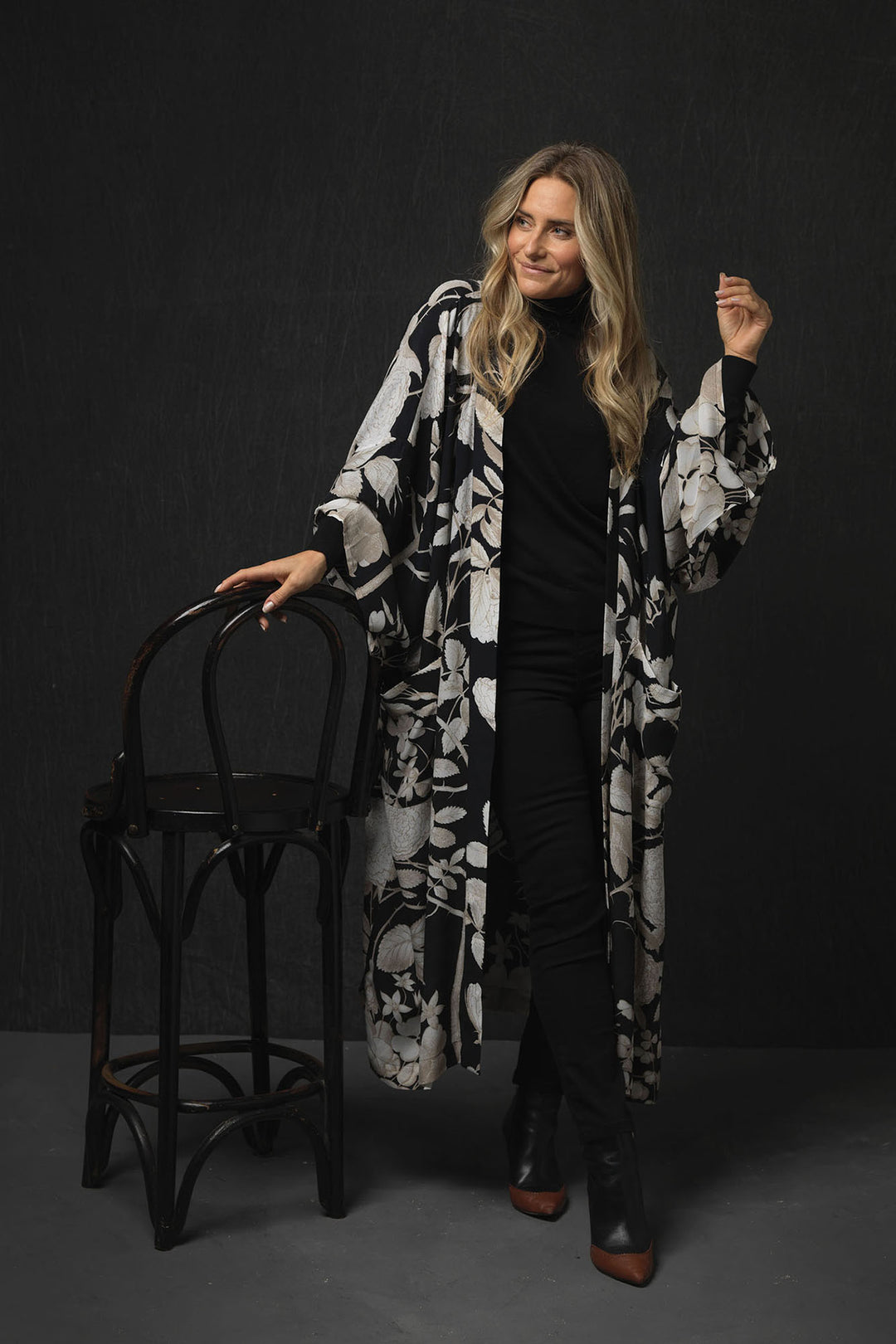 Rosebush Black Crepe Long Kimono- This kimono can be worn two ways, when tied at the back it makes a chic open fronted jacket. Alternatively, it can be worn tied at the front as a closed jacket or dress and secured using the interior waist tie. 