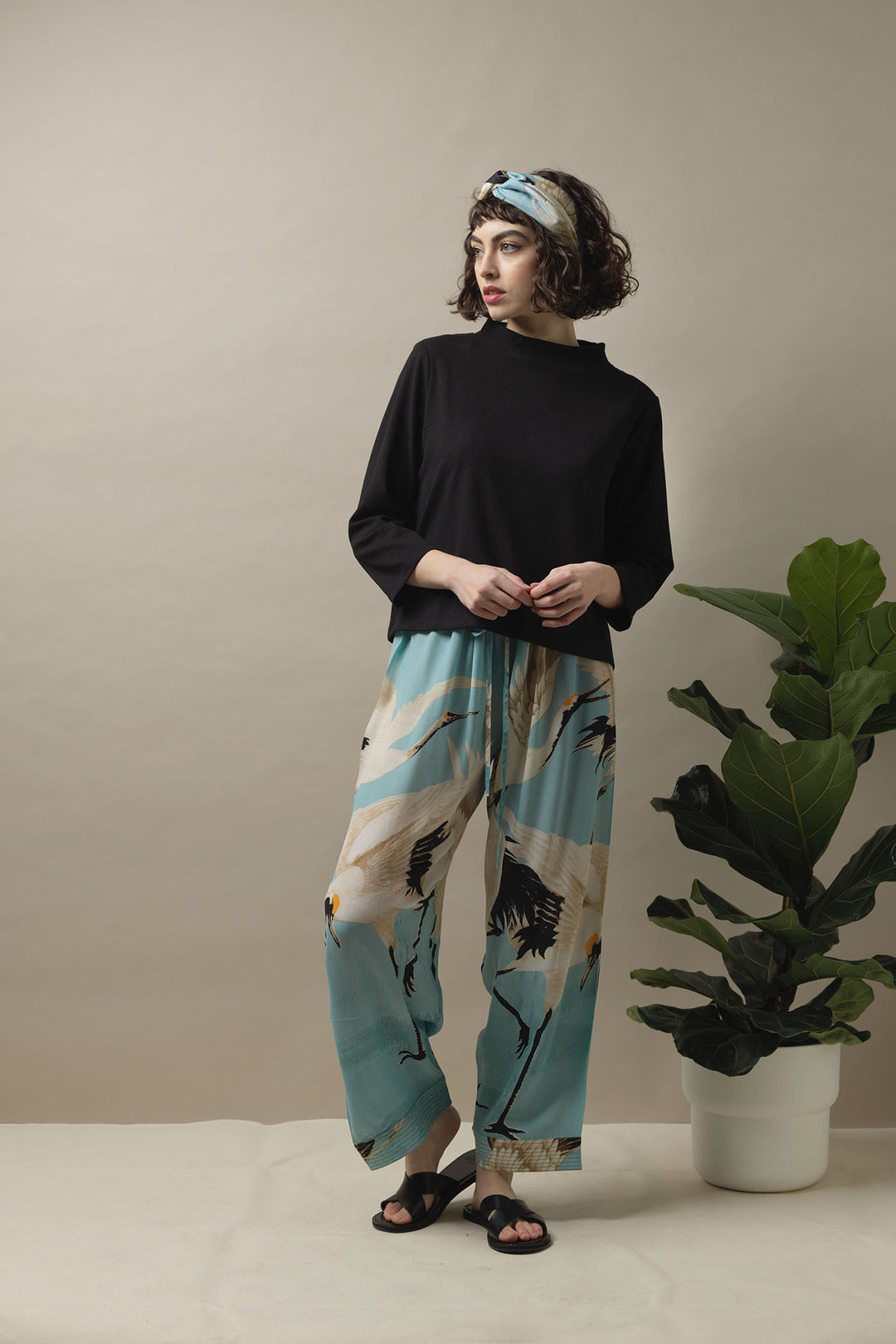 The One Hundred Stars Stork Crane Sky Blue Crepe Lounge Pants are great for that easy to wear outfit this summer, adding luxury to any outfit this season. 