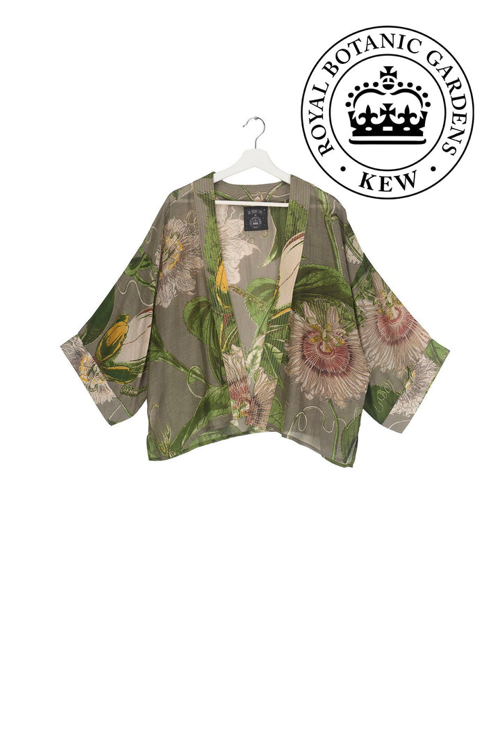 KEW Passion Flower Stone Kimono- Our bestselling kimono jackets have loose ¾ length sleeves, an open front and a lightly embroidered lapel. Pair with a matching camisole and your favourite jeans in summer or layer over a polo neck during the cooler months.